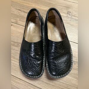 Alegria Embossed Black Slip-On Loafers